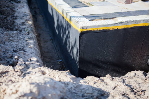 Professional Waterproofing technician working in Mountain, WI